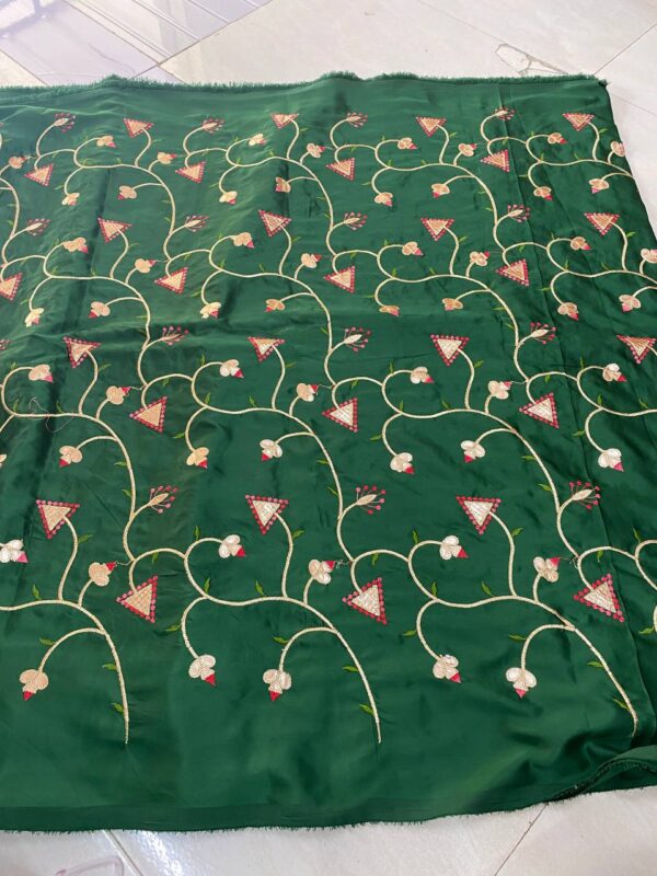 Soft silk fabric with intricate Gota embroidery, 44 inches wide, perfect for creating elegant and traditional outfits.