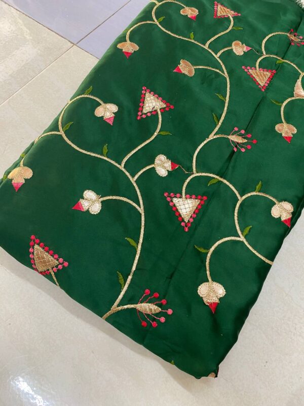 Soft silk fabric with intricate Gota embroidery, 44 inches wide, perfect for creating elegant and traditional outfits.