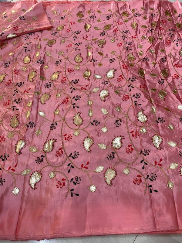 Soft silk fabric with intricate Gota embroidery, 44 inches wide, perfect for creating elegant and traditional outfits.