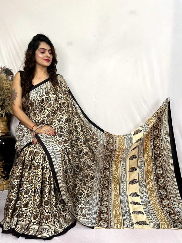 Pure Modal Silk sarees featuring hand block prints with Kalamkari, Indigo, and Vanaspati designs. Comes with a blouse.