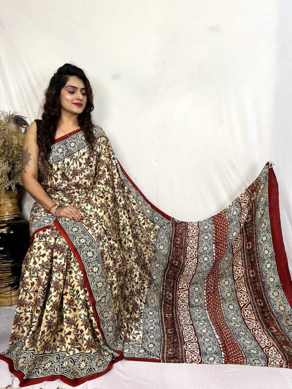 Pure Modal Silk sarees featuring hand block prints with Kalamkari, Indigo, and Vanaspati designs. Comes with a blouse.