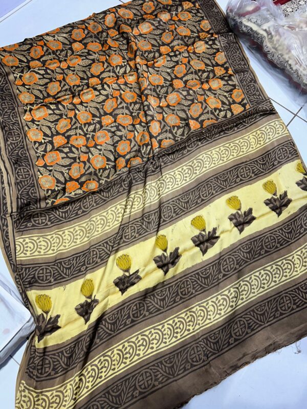 Pure Modal Silk sarees featuring hand block prints with Kalamkari, Indigo, and Vanaspati designs. Comes with a blouse.