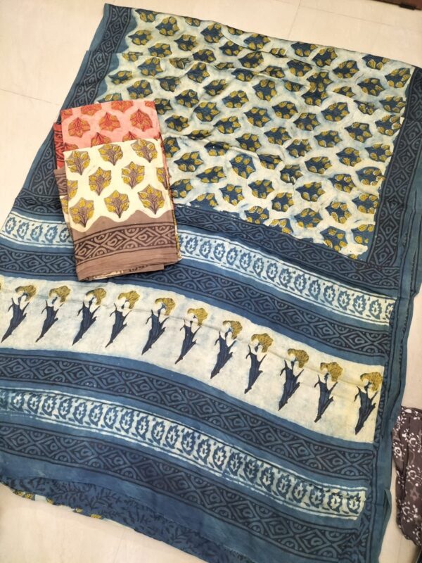 Pure Modal Silk sarees featuring hand block prints with Kalamkari, Indigo, and Vanaspati designs. Comes with a blouse.