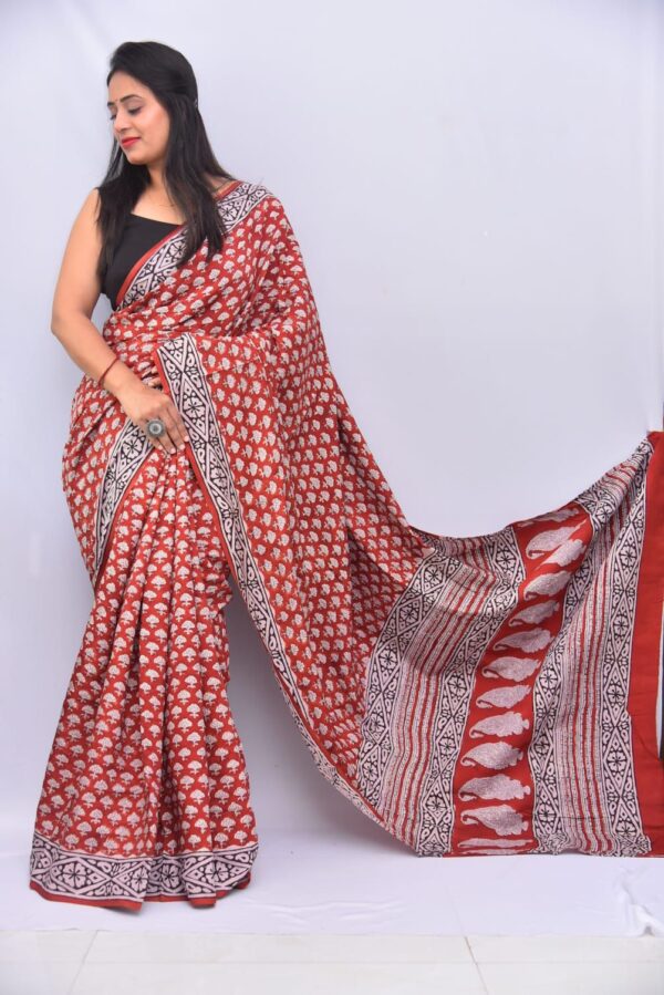 Pure Modal Silk sarees featuring hand block prints with Kalamkari, Indigo, and Vanaspati designs. Comes with a blouse.