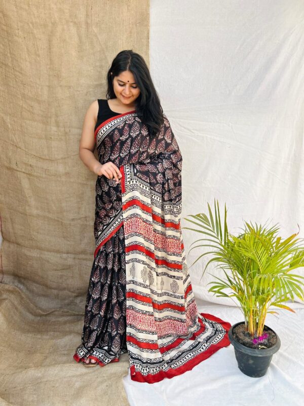 Pure Modal Silk sarees featuring hand block prints with Kalamkari, Indigo, and Vanaspati designs. Comes with a blouse.