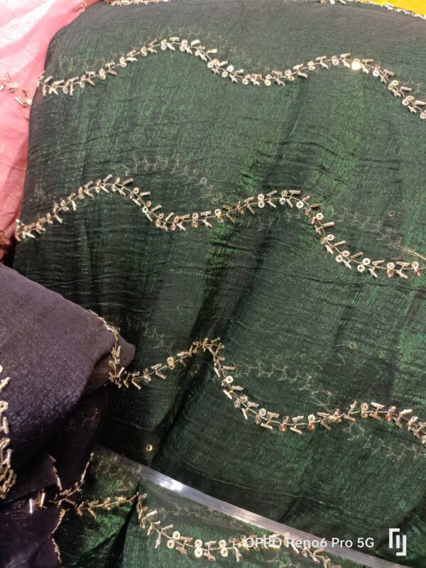 Soft Crunchy Silk fabric with heavy beads all over embroidery, perfect for luxury fashion and bridal wear.