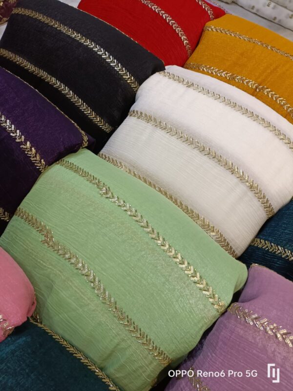 Soft Crunchy Silk fabric with heavy beads all over embroidery, perfect for luxury fashion and bridal wear.