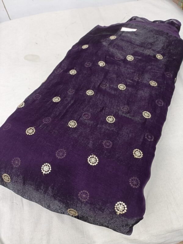 Luxurious Space Silk fabric with butties work, 44 inches wide, ideal for designer dresses.