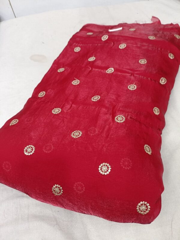 Luxurious Space Silk fabric with butties work, 44 inches wide, ideal for designer dresses.