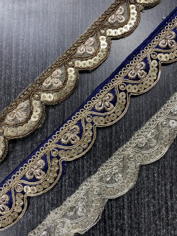 Elevate your designs with Elegant Cutwork Lace. Perfect for sarees, blouses, and dresses, priced at ₹360 per roll.