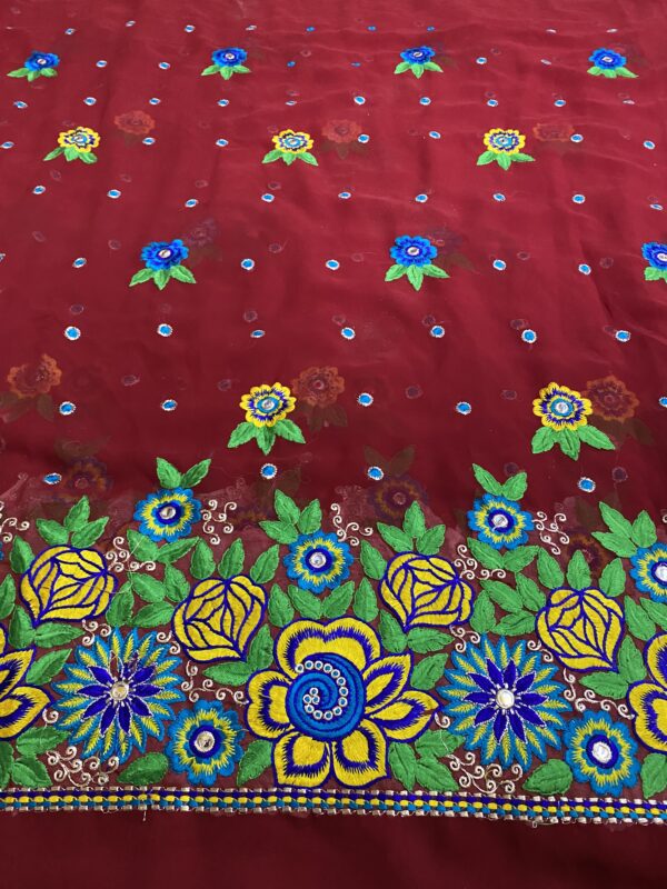 Enhance your designs with Elegant Georgette Fabric. Featuring daman embroidery, this 44-inch fabric is available for ₹160/m. Perfect for all styles.