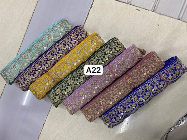 Enhance your designs with luxurious Soft Silk Lace. With intricate cording embroidery and cutwork, it's ideal for sarees, blouses, and more. ₹480 per roll.