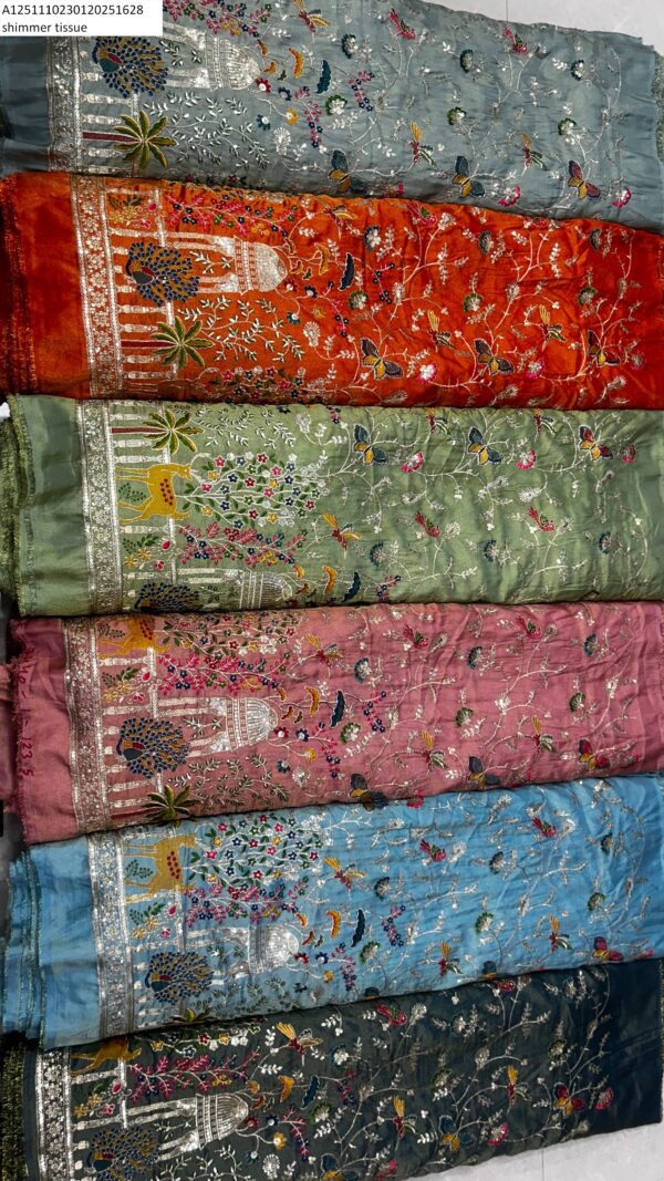 Discover stunning Shimmer Tissue Fabric with heavy multi-sequence thread work at just ₹585/meter. Perfect for luxurious outfits and celebrations