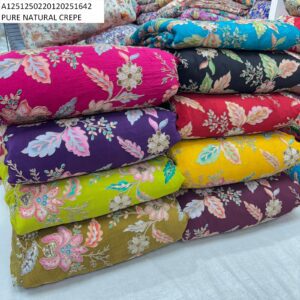 Pure Natural Crepe Fabric with position print embroidery at ₹655/meter. Perfect for elegant sarees, gowns, and kurtas.