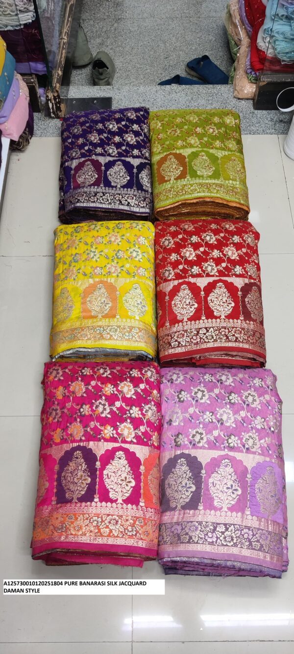 Indulge in the elegance of Pure Banarasi Silk Jacquard Daman Style. Perfect for sarees and lehengas at ₹395 per meter.