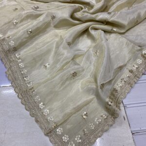 Discover the elegance of the Pure Dyeable Shimmer Tissue Silk Dupatta. Featuring a stunning cut work border and small butties, this dupatta is perfect for all occasions. Shop now!