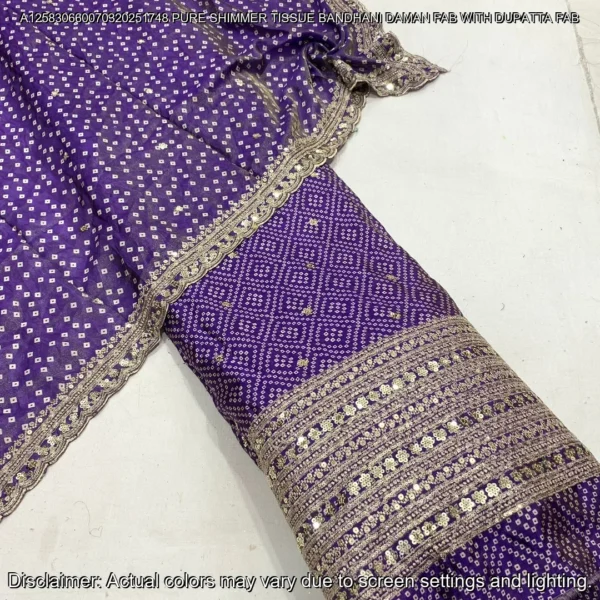 "Discover our luxurious Shimmer Tissue Silk Fabric with Bandhani Print, featuring sequins zari daman work and a matching dupatta. Perfect for elegant ensembles."