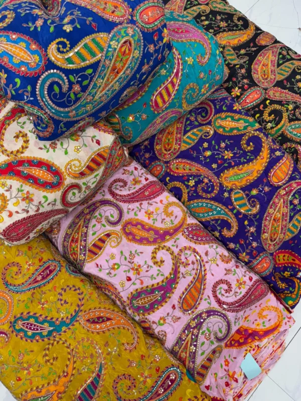 Full view of printed and embroidered natural crepe
