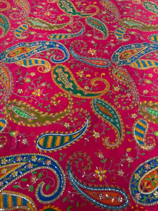 Natural crepe fabric showcasing print and embroidery